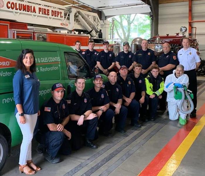 SERVPRO and Fire Department posing for a picture after the cleaning
