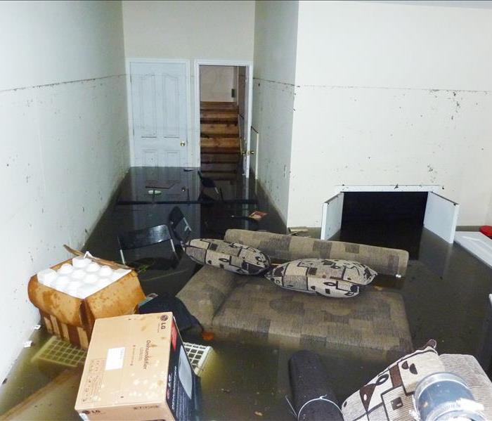 Completely flooded basement in Murfreesboro, TN. A visible line is showing maximum water level higher than 7 feet.