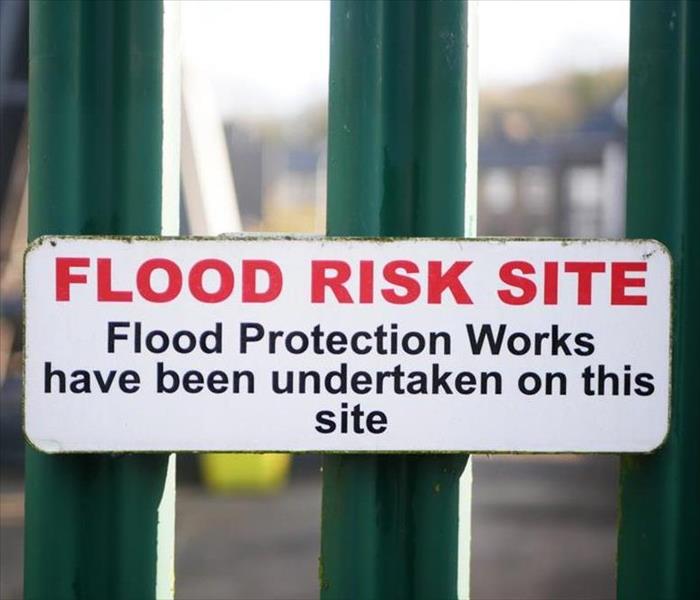 Sign that says "Flood Risk Site"