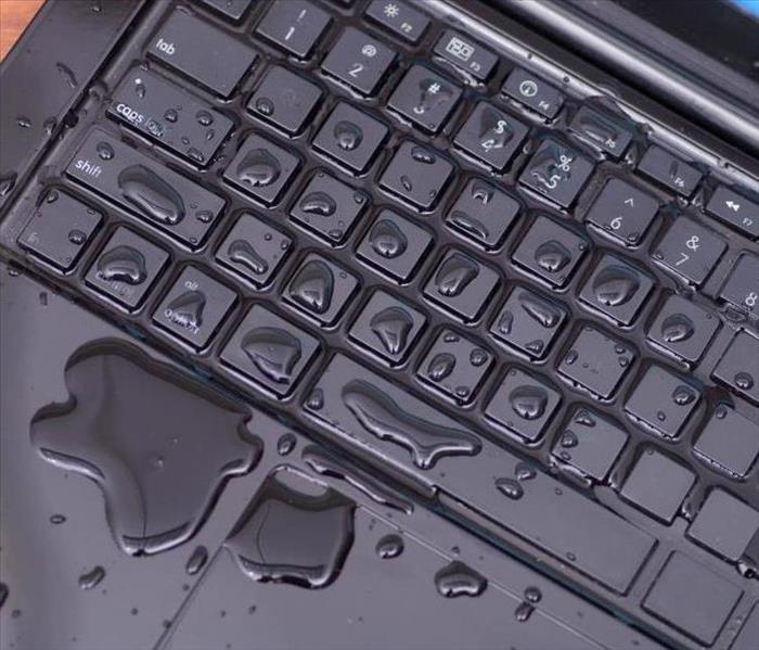Water on keyboard of a computer